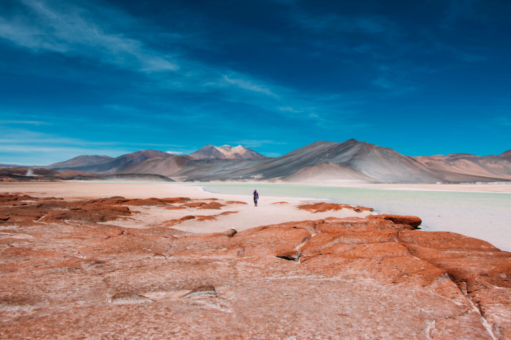 Stunning Desert Landscape HD Wallpaper with Red Rocks & Blue Sky