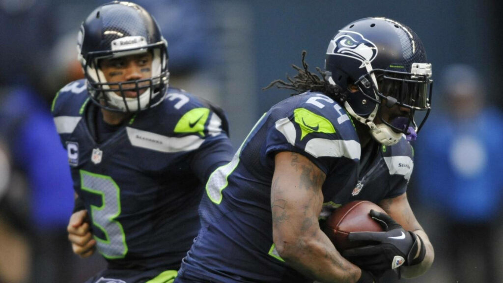 High-Definition Seattle Seahawks Football Wallpaper - Dynamic Action Shot