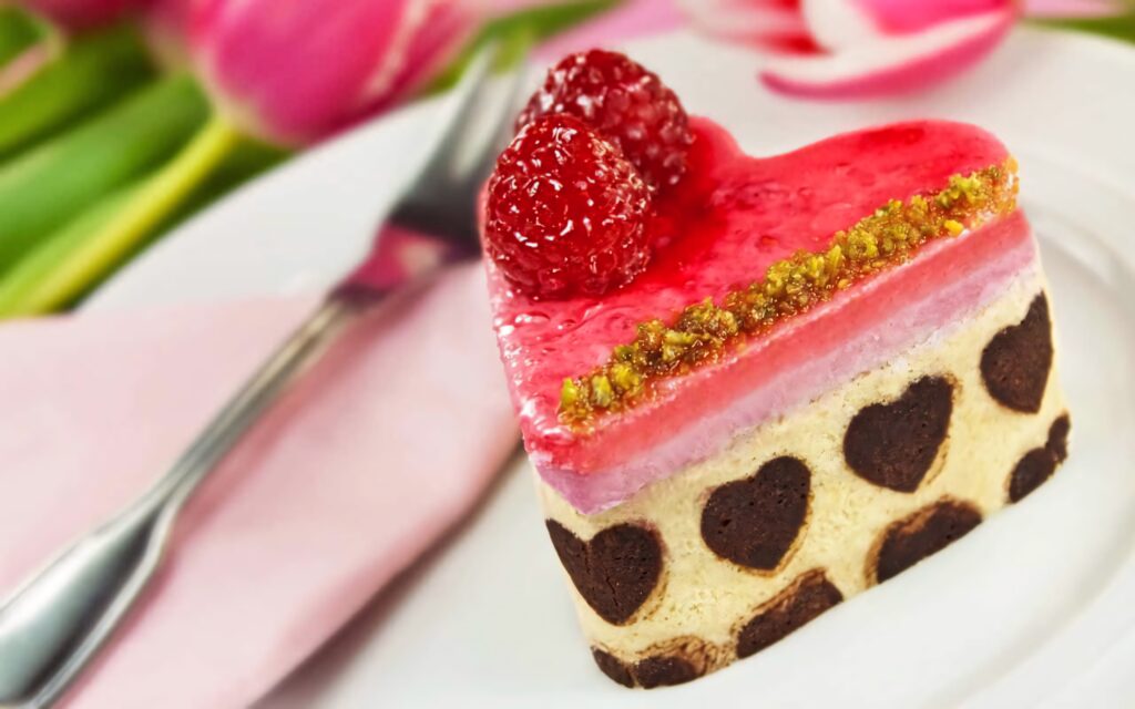 HD strawberry cake with glossy glaze fresh raspberries pistachios heart-shaped sponge dessert Wallpaper