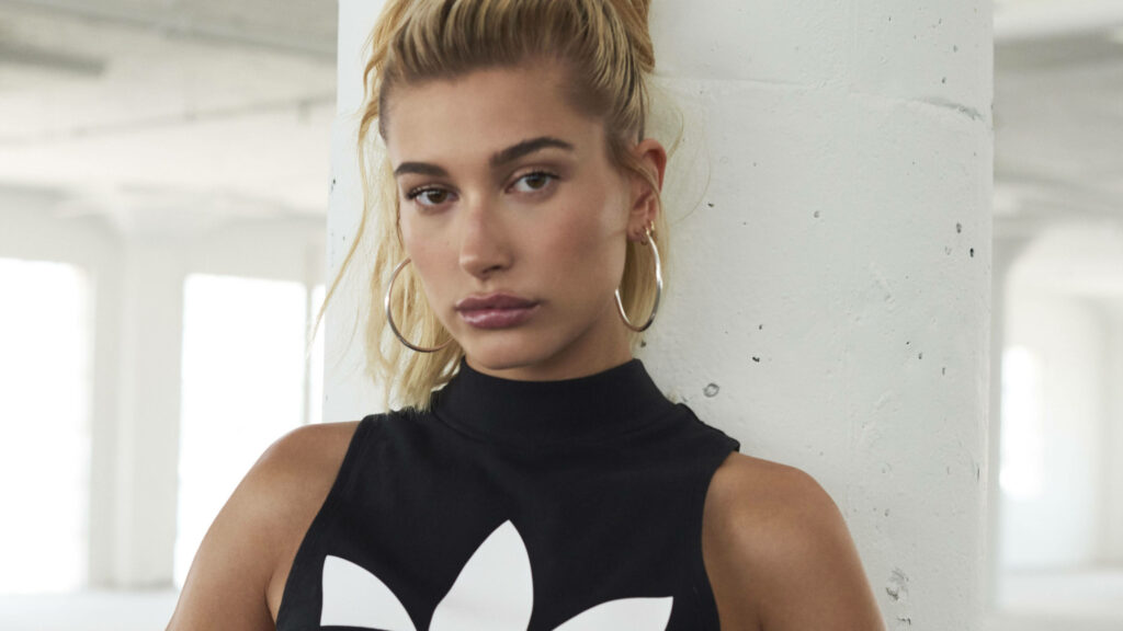Hailey Bieber: Confidently Posing in Adidas - Stylish Wallpaper