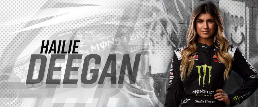 Hailie Deegan in black Monster Energy racing suit on dynamic grey white motorsports wallpaper
