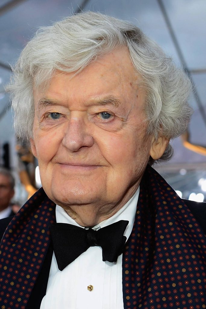 Portrait of Hal Holbrook in black tuxedo and patterned scarf with soft event lighting wallpaper