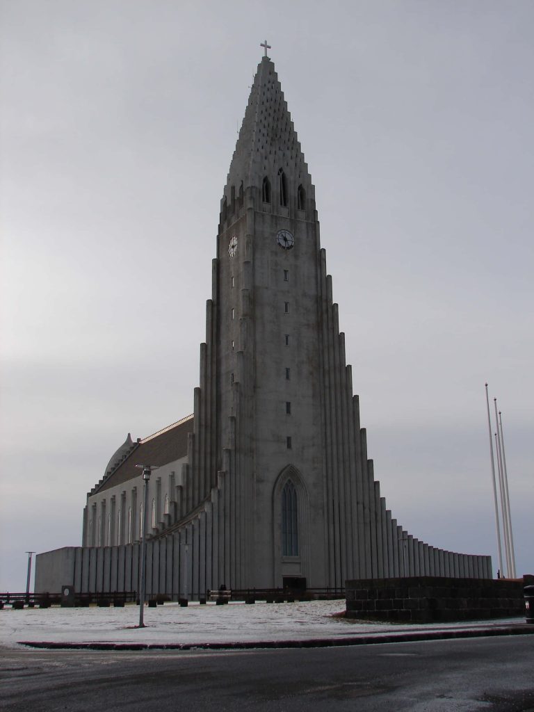 Hallgrímskirkja church in Reykjavík Iceland winter snow minimalistic architecture wallpaper background