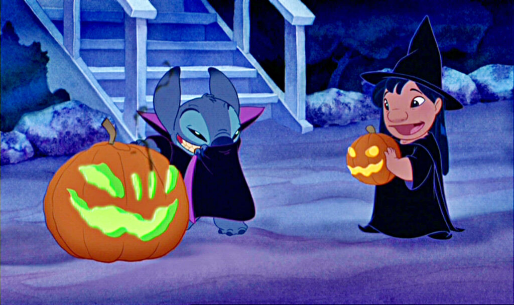 Fun Halloween Wallpaper: Cartoon Creatures in Costumes & Spooky Scene