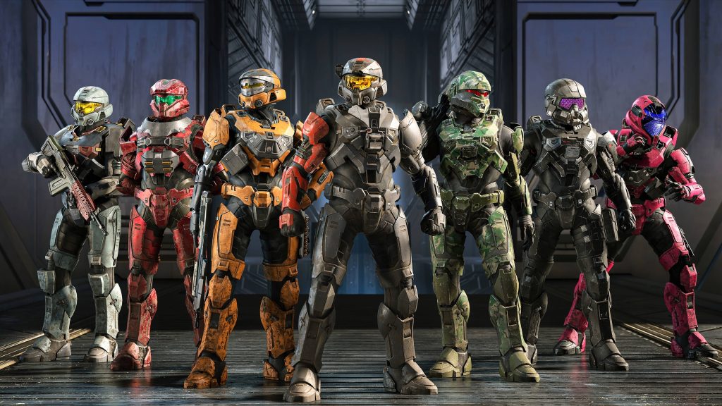 Halo Infinite SPARTAN IV soldiers lineup in colorful armor in moody industrial hangar wallpaper