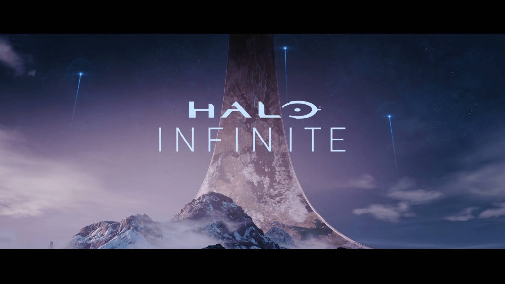 Halo Infinite wallpaper with Zeta Halo ring over snowy mountains at twilight dramatic sky