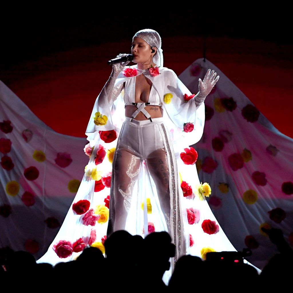 Halsey 2017 Billboard Music Awards white rose sheer outfit singing on stage floral backdrop Wallpaper