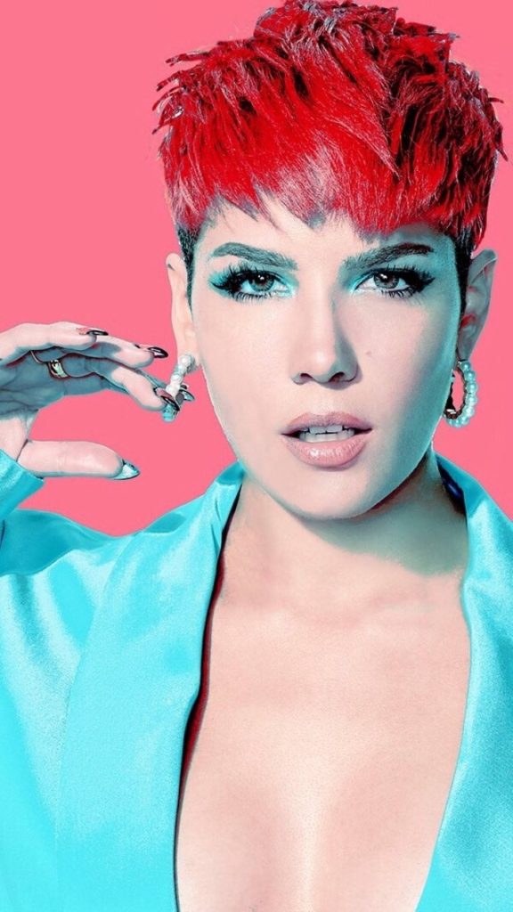 Halsey portrait with red pixie cut teal eyeshadow turquoise blazer pearl earrings pink background Wallpaper
