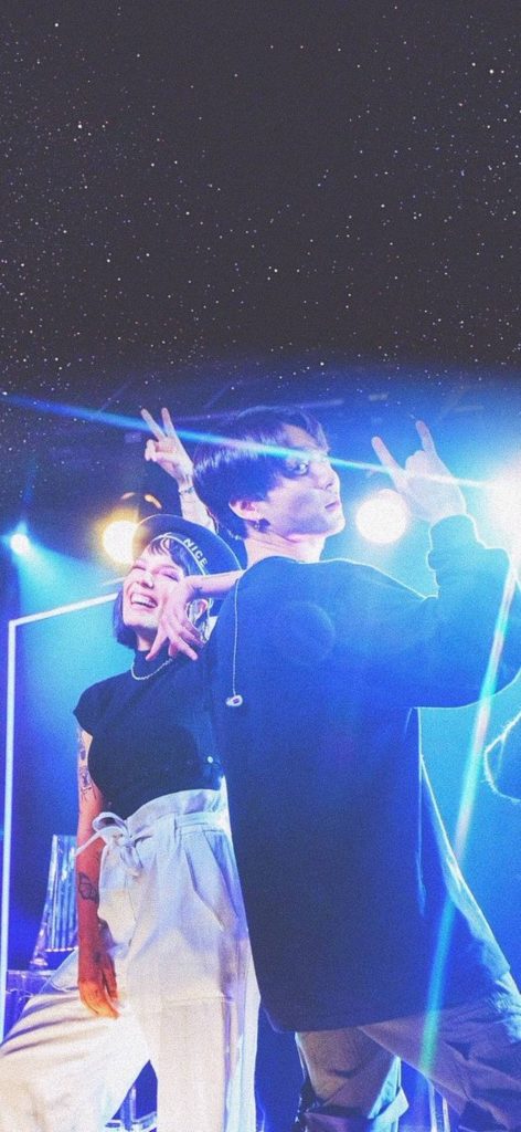 Halsey and BTS Jungkook in vibrant blue concert lighting starry backdrop dynamic music wallpaper