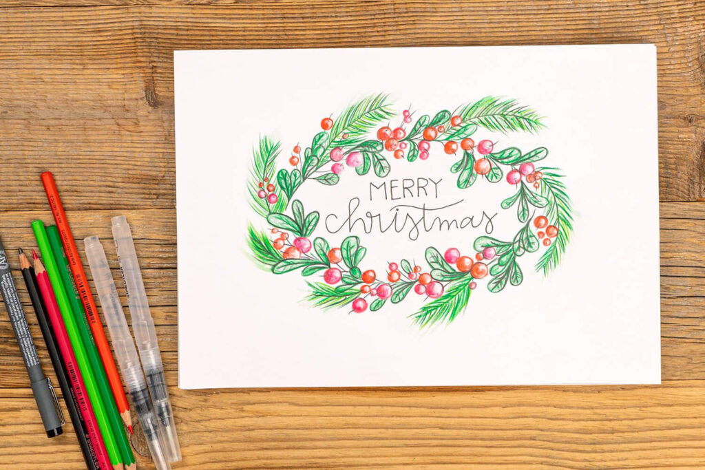 Handcrafted Christmas Card Wallpaper with Holly Wreath Design