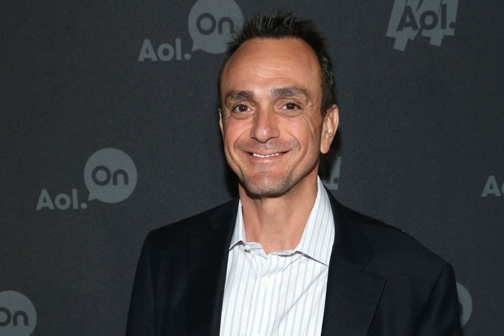 Hank Azaria smiling portrait in dark blazer at AOL event stylish celebrity wallpaper background