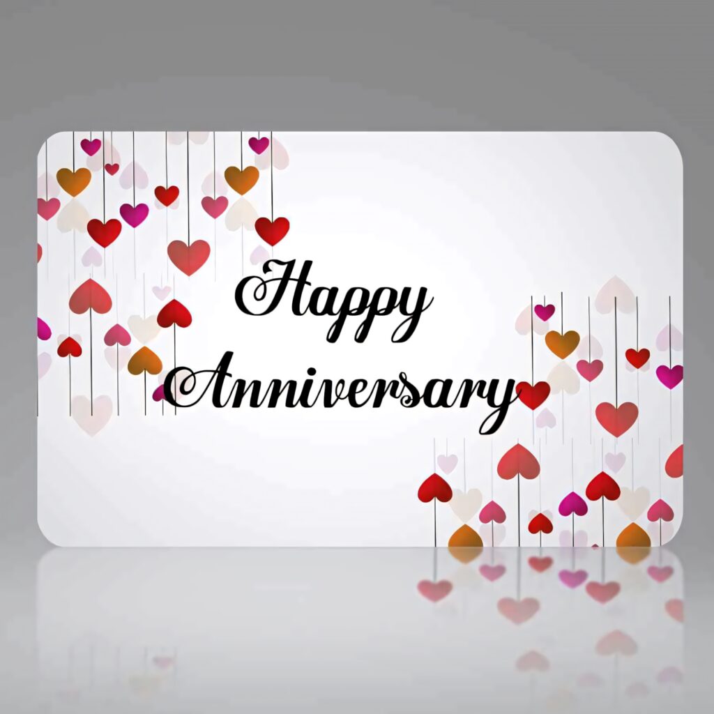 Happy Anniversary wallpaper with colorful hanging hearts festive heartfelt celebration background