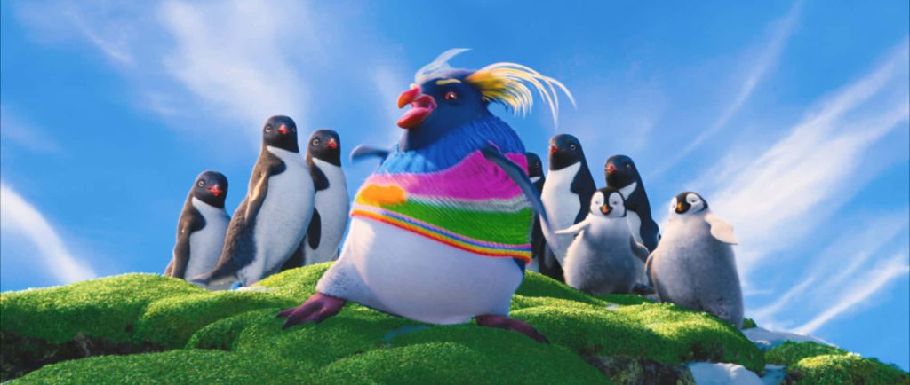 Happy Feet Two CGI wallpaper featuring Lovelace Rockhopper penguin in colorful sweater on hill