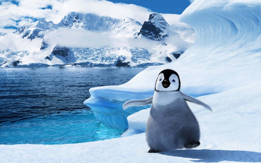 Penguin chick Erik on snowy Antarctic landscape with icy mountains and vibrant blue water wallpaper