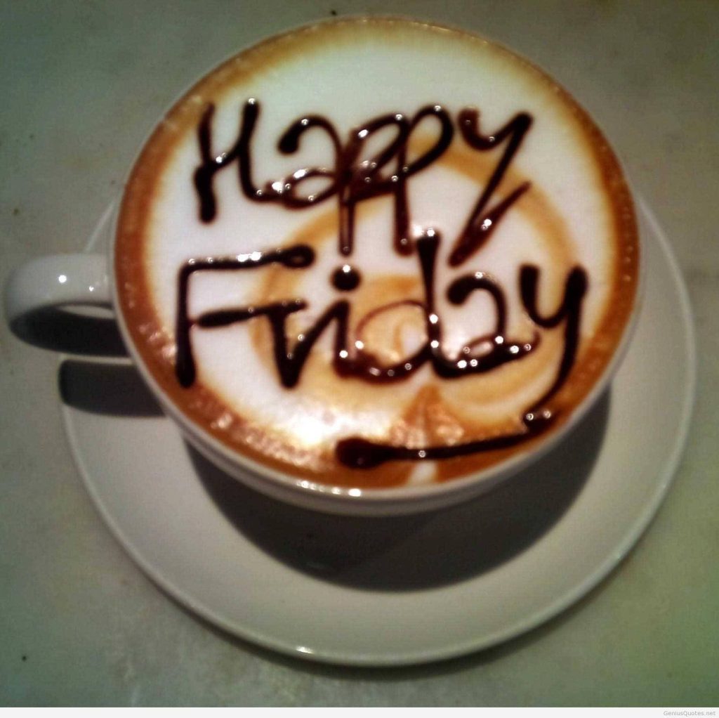 Top-down cappuccino with Happy Friday chocolate syrup art on foam cozy coffee cup wallpaper