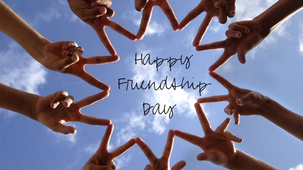 Hands forming star shape against bright blue sky Happy Friendship Day wallpaper background