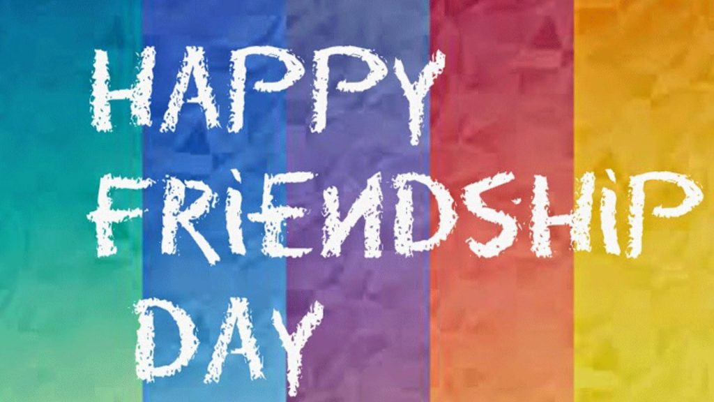 Happy Friendship Day wallpaper with bold white distressed text on vibrant colorful stripes background