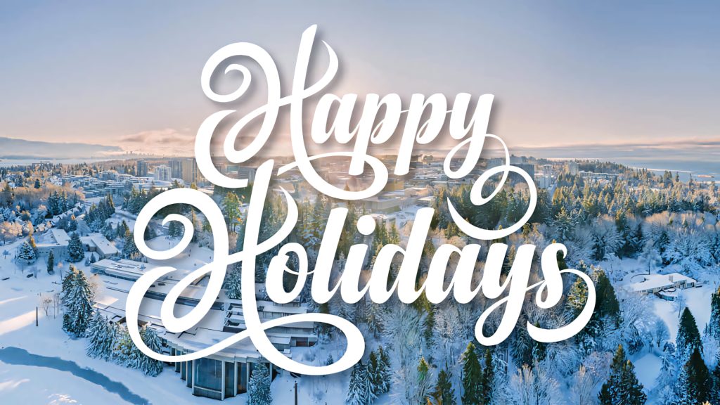 Snow-covered town winter landscape with golden morning light happy holidays wallpaper background