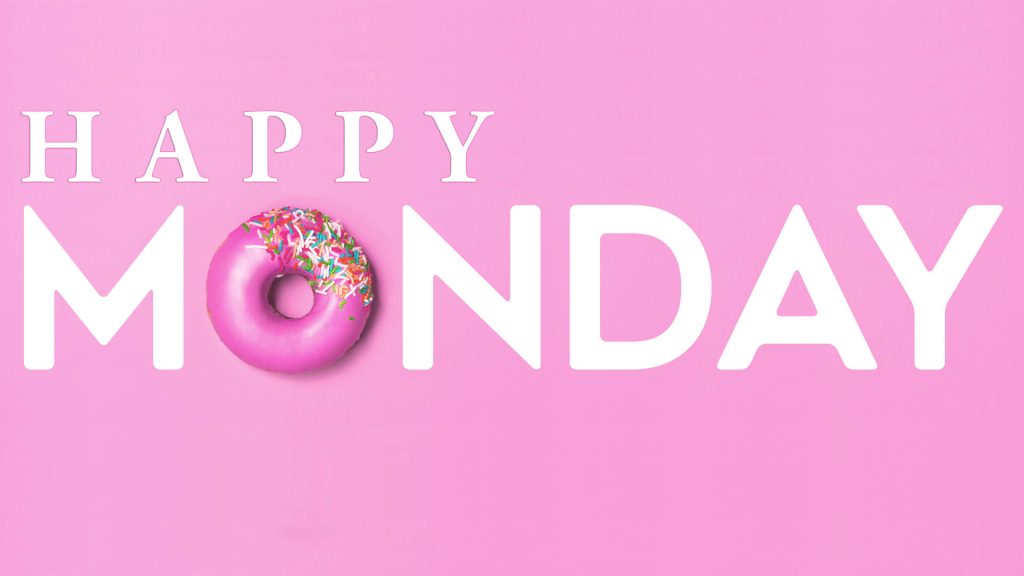 Happy Monday wallpaper with pink frosted doughnut and colorful sprinkles on pastel pink background
