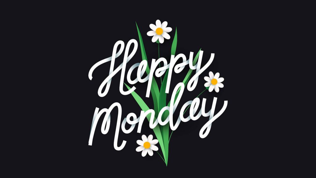 Happy Monday wallpaper with white cursive text daisies and green grass on black background