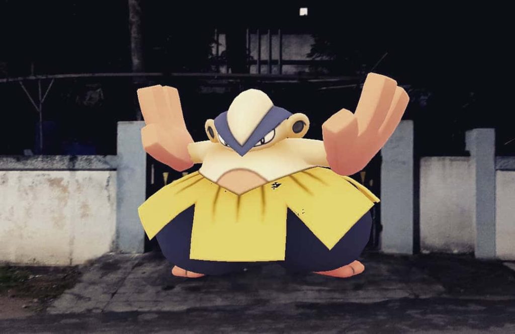 3D AR wallpaper of Fighting-type Pokémon Hariyama with yellow mawashi at residential gate