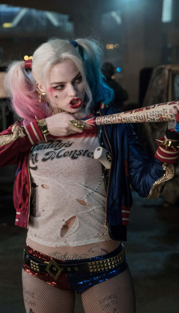 Vibrant Harley Quinn Wallpaper: Iconic Costume & Playful Expression