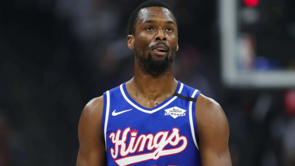 Close-up of NBA star Harrison Barnes in Sacramento Kings jersey with Blue Diamond patch Wallpaper