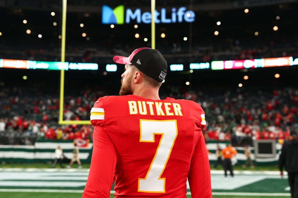 Harrison Butker Kansas City Chiefs kicker in red jersey focused at MetLife Stadium wallpaper