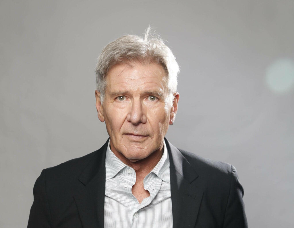 Harrison Ford as Han Solo - Iconic Wallpaper with Minimalist Background