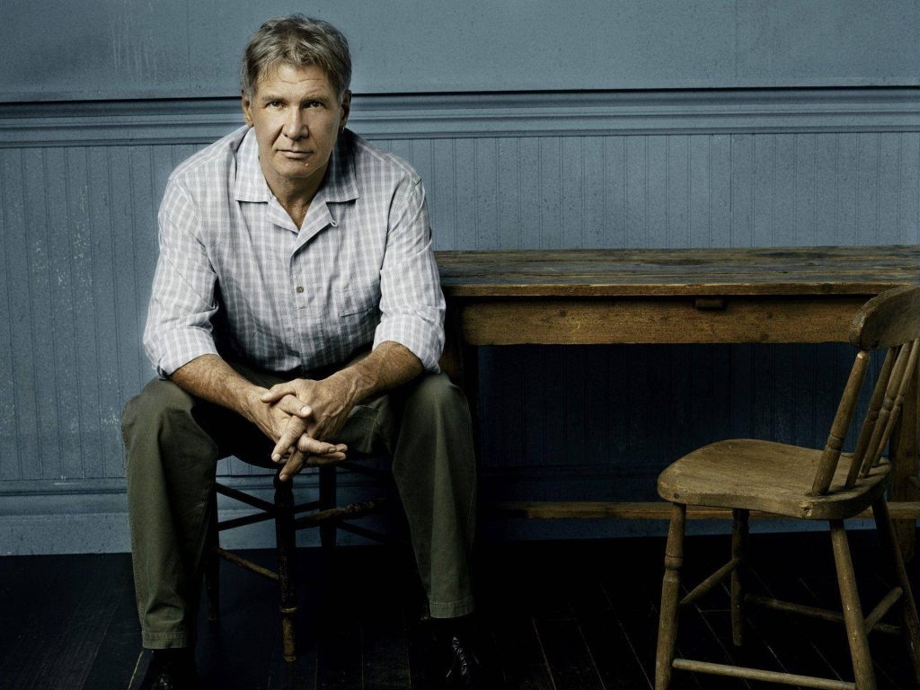 Harrison Ford portrait in rustic setting with blue wainscoting and soft natural lighting Wallpaper