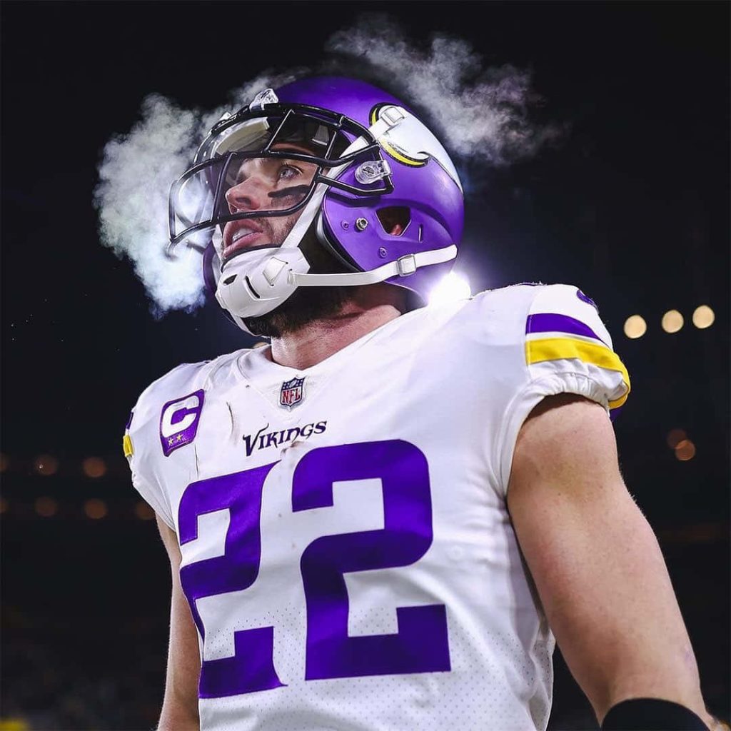 Minnesota Vikings safety Harrison Smith in white jersey focused during cold NFL night game Wallpaper