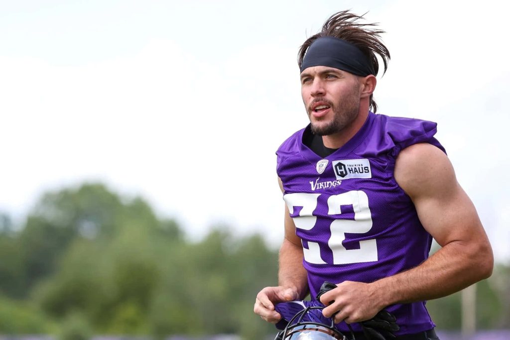 Minnesota Vikings safety Harrison Smith in purple jersey number 22 training outdoors NFL wallpaper
