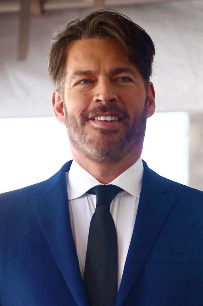 Harry Connick Jr confident in navy suit white shirt black tie smiling blue eyes wallpaper background