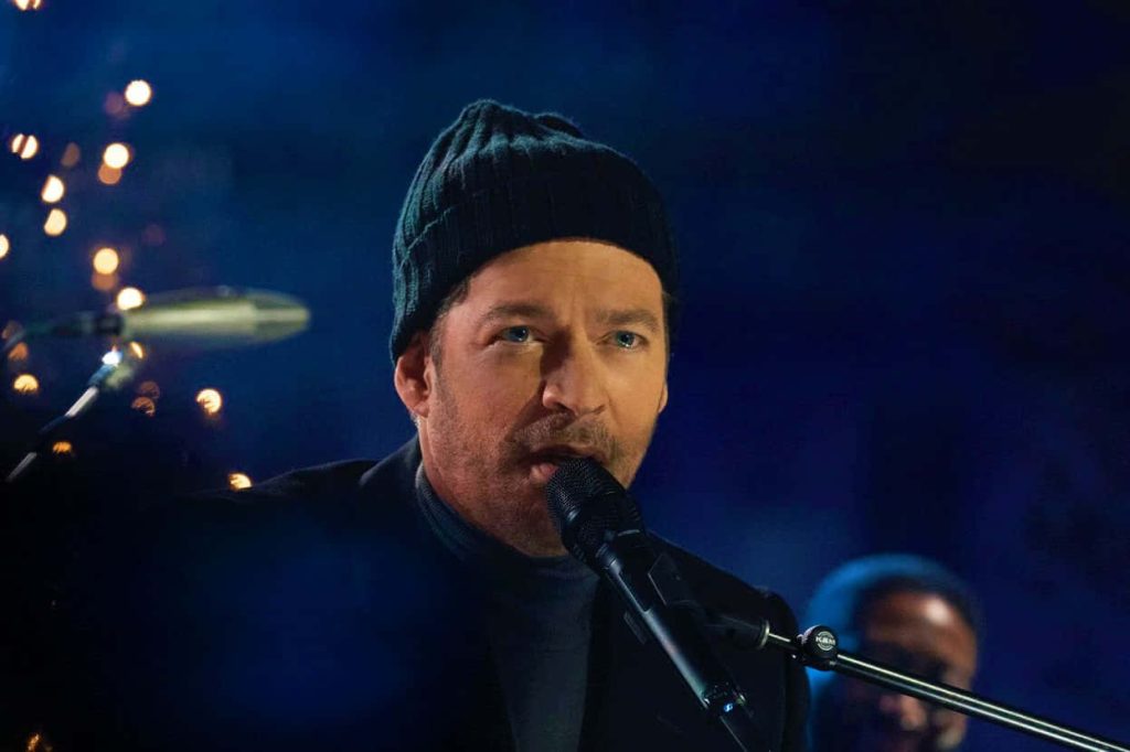 Harry Connick Jr. live concert moody wallpaper dark beanie soft bokeh lighting deep blue background