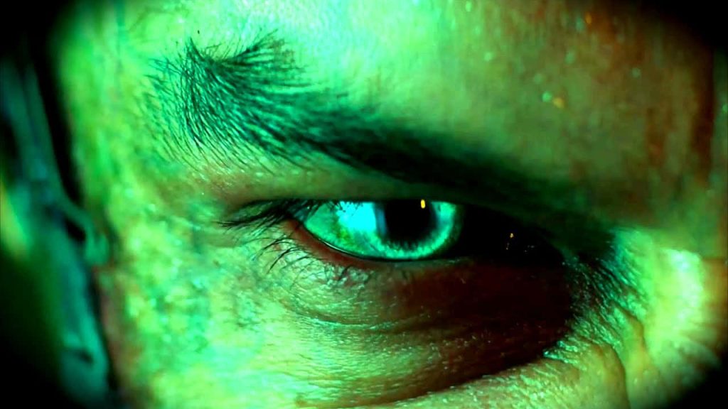 Extreme close-up of Harry Osborn's eye in green light from The Amazing Spider-Man 2 wallpaper
