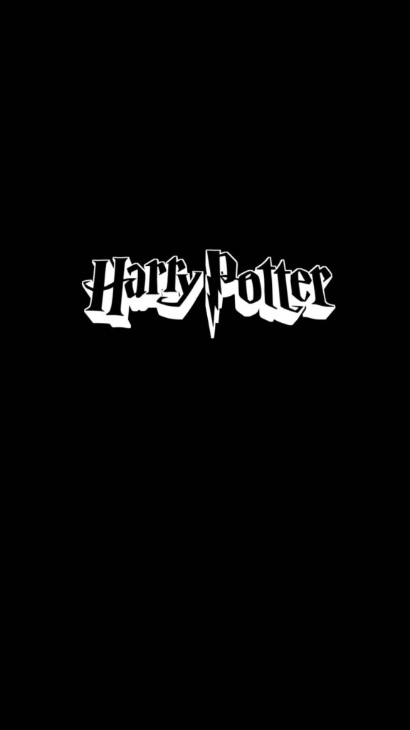 Hogwarts Harry Potter Logo Wallpaper: Magical Dark Background
