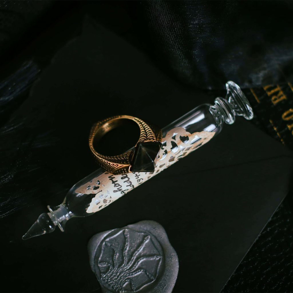 Harry Potter wallpaper with Lord Voldemort Gaunt ring Horcrux and Dark Mark on dark background