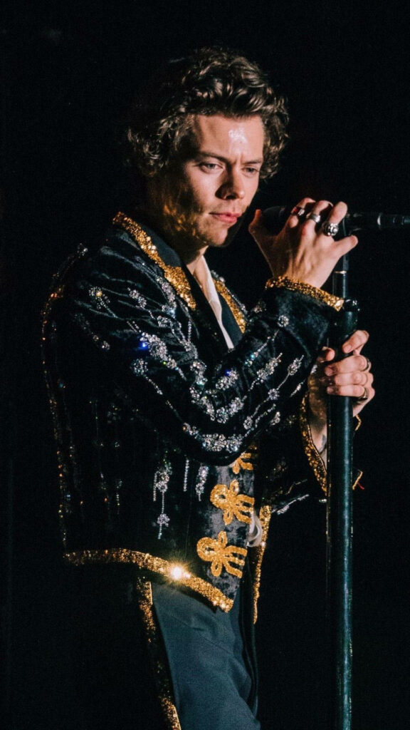 Elegant Harry Styles Dazzles in Black & Gold Suit - Stage Wallpaper