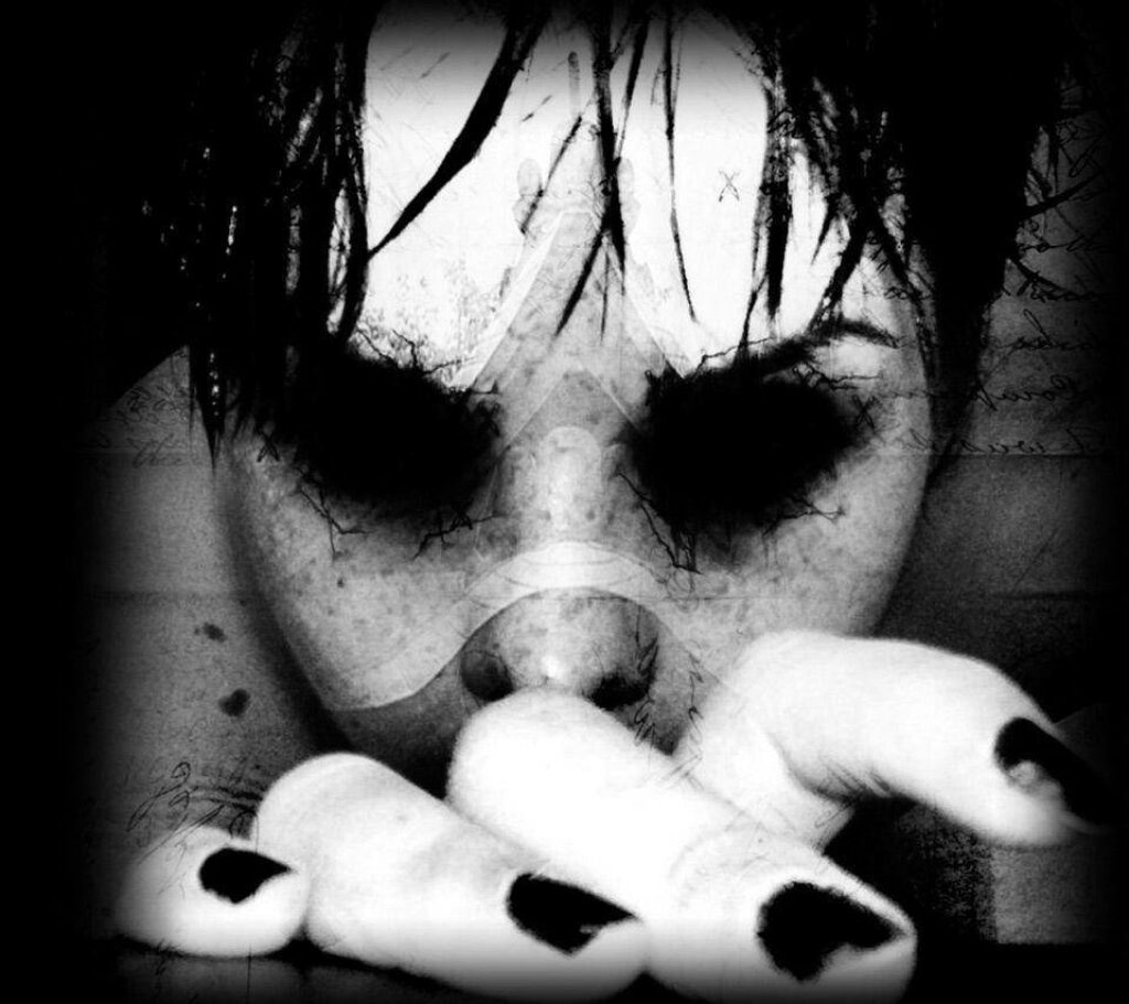 Haunting Monochrome Face Wallpaper with Ominous Eyes & Dark Aesthetic