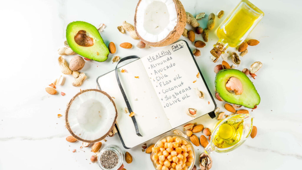 Healthy Fats Flat Lay: Avocados, Nuts & Oils Wallpaper Background