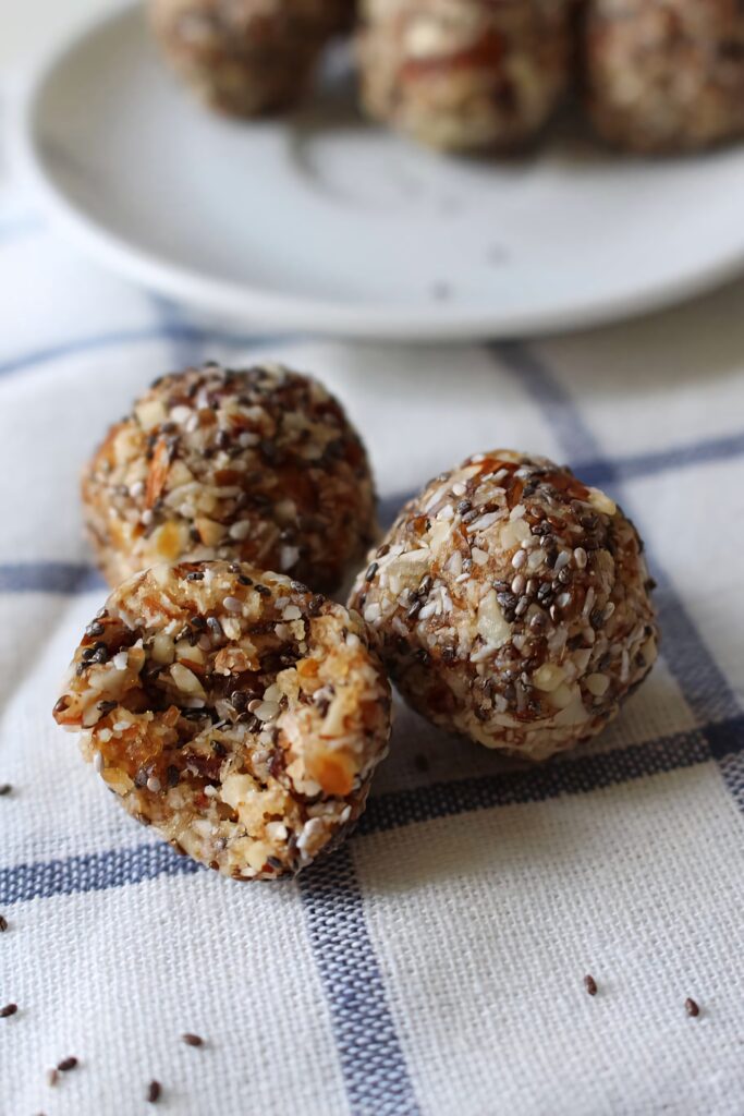 Close up of textured chia seeds and puffed rice balls on soft neutral background healthy snack wallpaper