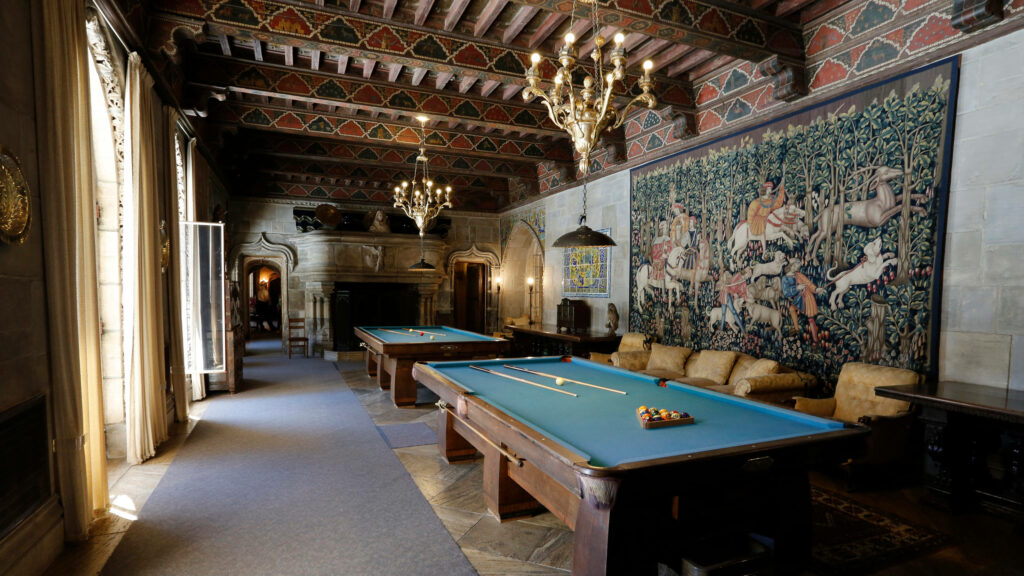 Opulent Hearst Castle billiard room with ornate ceilings grand chandeliers and detailed tapestry Wallpaper