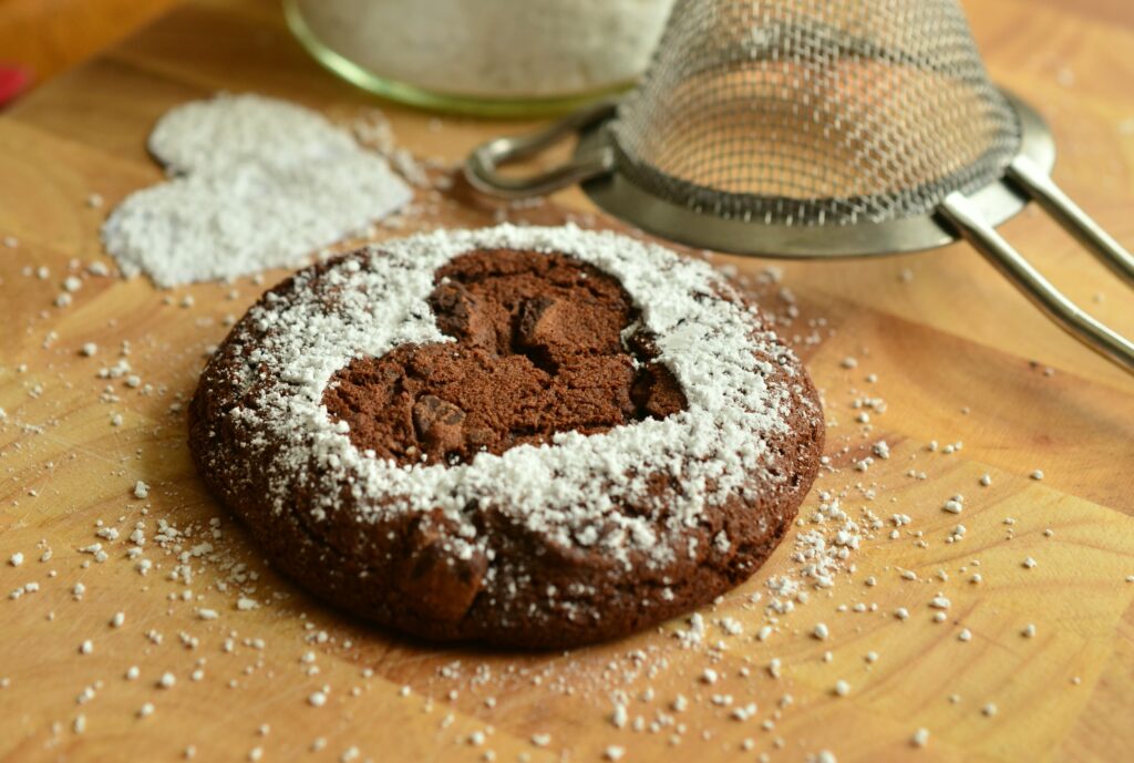 Heart-Shaped Chocolate Cookie Wallpaper with Powdered Sugar