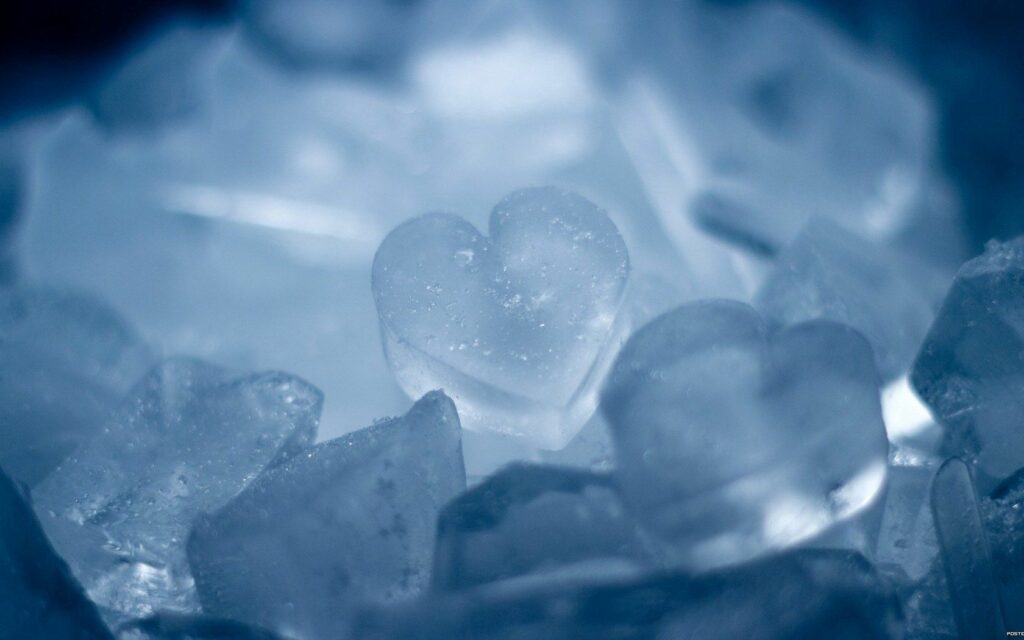 Serene Heart-Shaped Ice Wallpaper: Cool Snowy Background