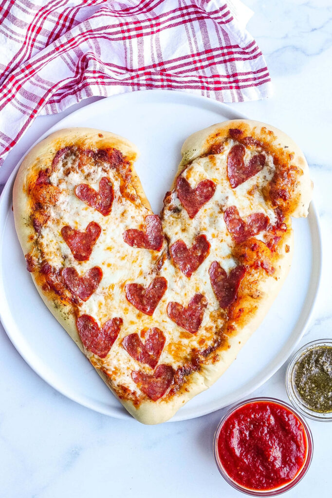 Heart-Shaped Mozzarella Pizza with Pepperoni - Tasty Wallpaper Background