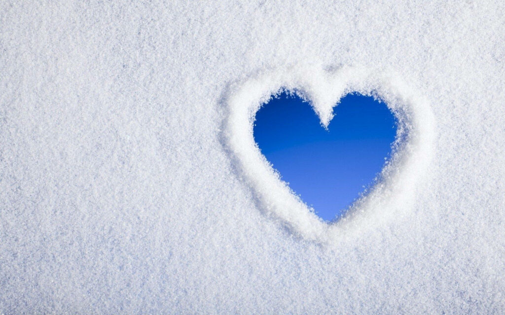 Heart-Shaped Snow Cutout: Serene Winter Wallpaper Background
