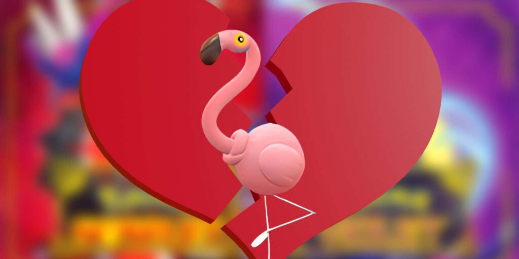 Heartbroken Flamingo: Emotional Wallpaper with Red Heart Backdrop