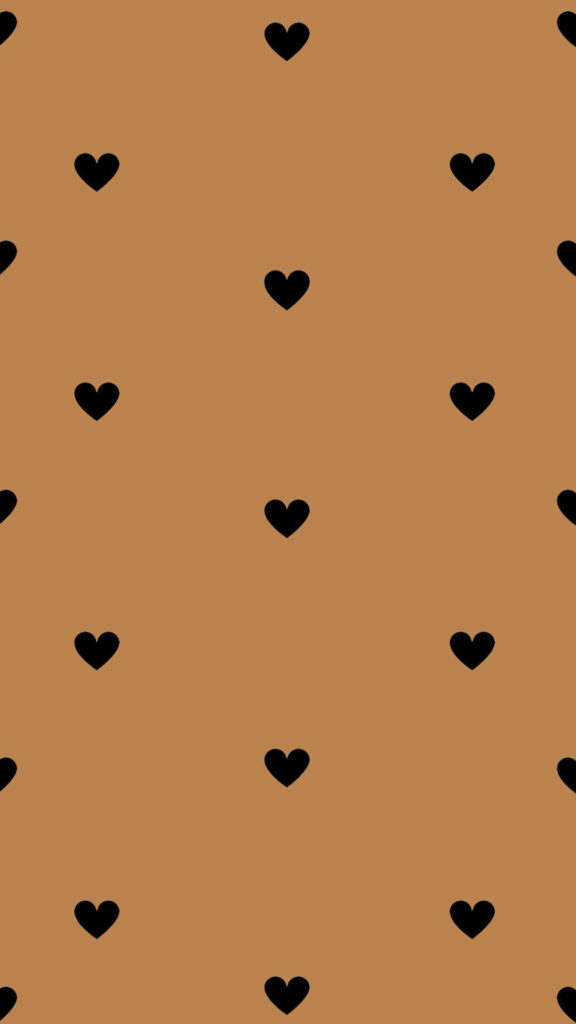 Captivating Delicacy: Mesmerizing Tiny Black Hearts on a Gentle Hazelnut Canvas Wallpaper