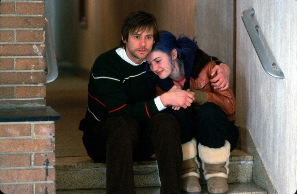 Heartfelt Eternal Sunshine Wallpaper: Tender Hug Scene of Joel & Clementine