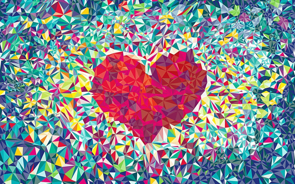 Vibrant low poly red heart mosaic wallpaper with colorful geometric shards background design